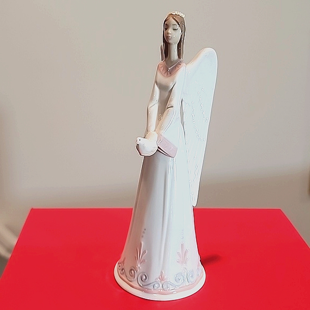 Lladró Sounds of Peace Porcelain Angel Bell.